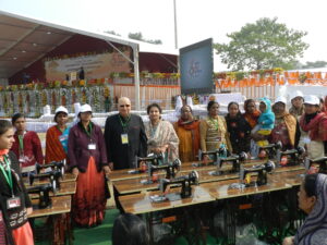 Lord and Lady Loomba with sewing machines